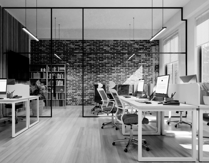 Een moderne kantoorruimte met bakstenen muren, glazen wanden en houten vloeren. Kenmerken omvatten meerdere bureaus met computers, ergonomische stoelen en plafondverlichting. de kamer heeft een eigentijdse, strakke designesthetiek.